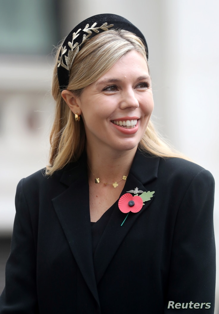 Carrie Symonds, partner of Britain's Prime Minister Boris Johnson meets veterans during the National Service of Remembrance at…