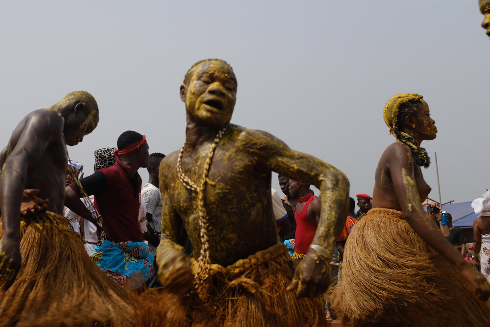 Man dancing during ritual that took place during the Festival of Voodoo in Benin