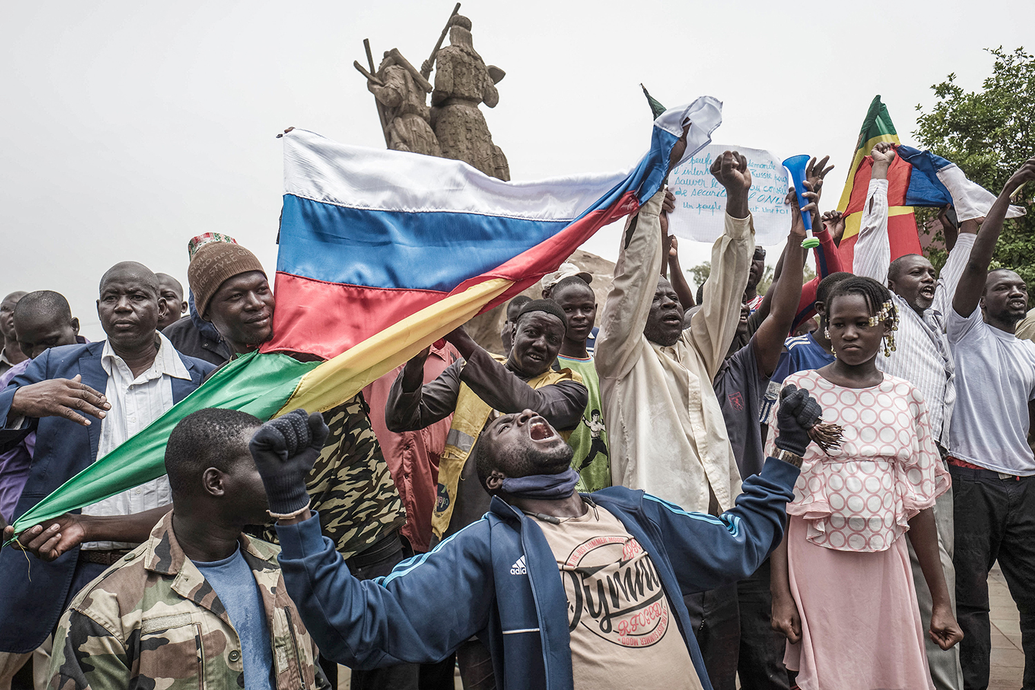 Protesters wave Russian and Malian flags during a demonstration in Bamako, Mali, on May 27, 2021, against French influence in the country.
