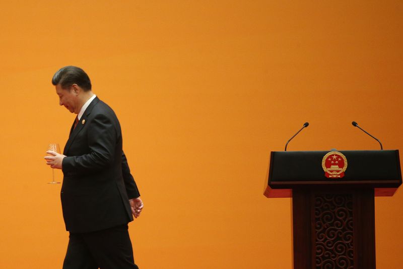 Chinese President Xi Jinping leaves after making a toast during a welcome banquet for the Belt and Road Forum at the Great Hall of the People in Beijing on May 14, 2017. Wu Hong/Getty Images