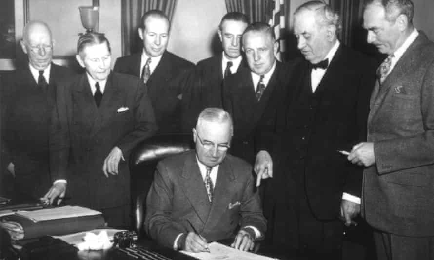 President Truman signs the Economic Assistance Act, a programme for the reconstruction of Europe 19 April 1949.