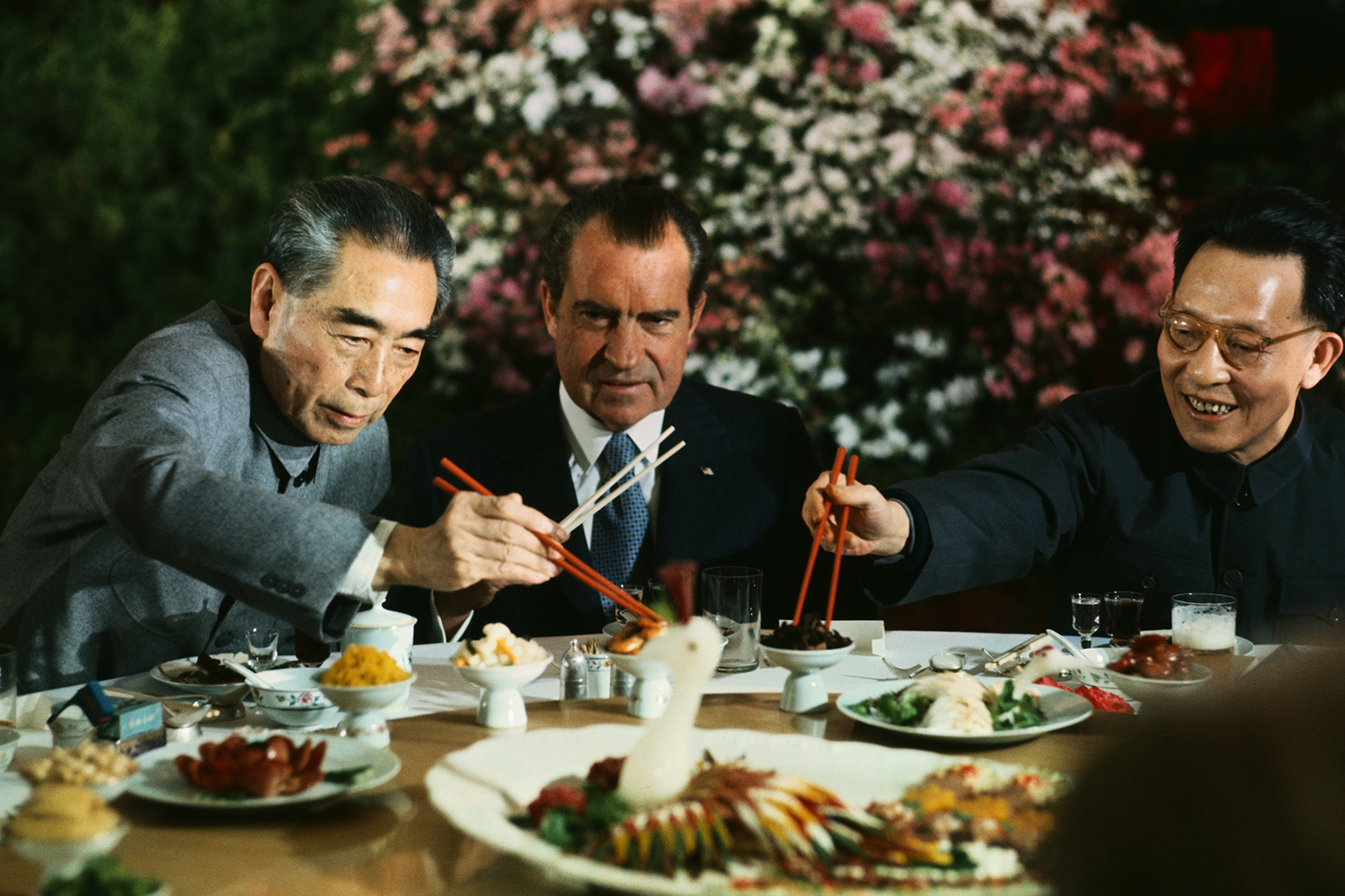 Former President Richard Nixon holds his chopsticks